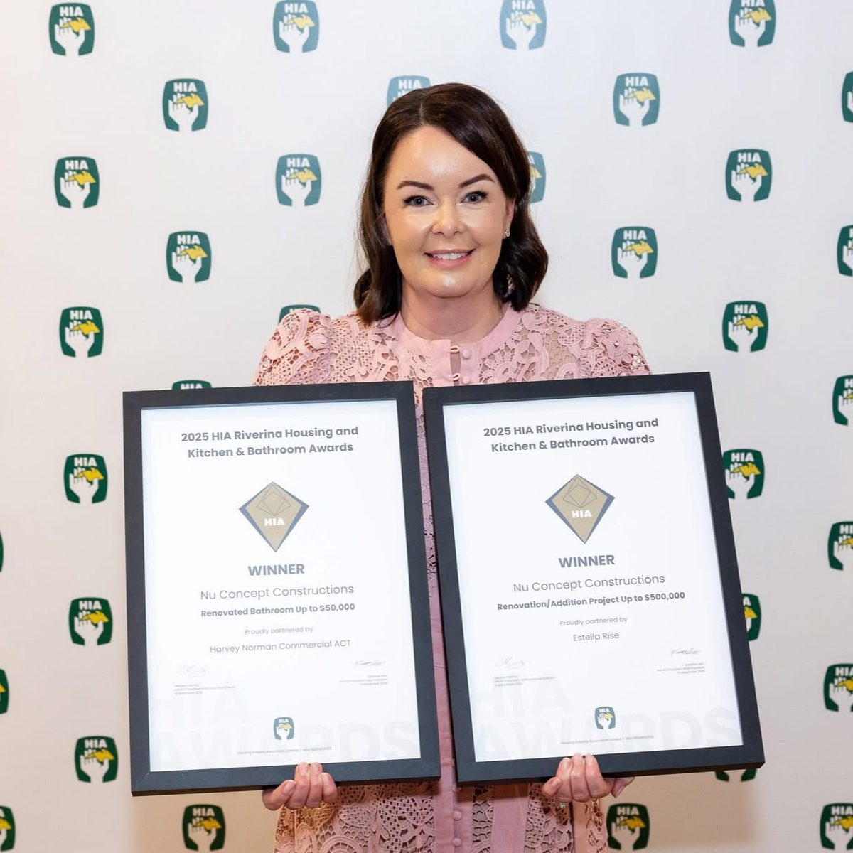 Andrea Elliott with two 2025 HIA Riverina Housing and Kitchen & Bathroom Awards