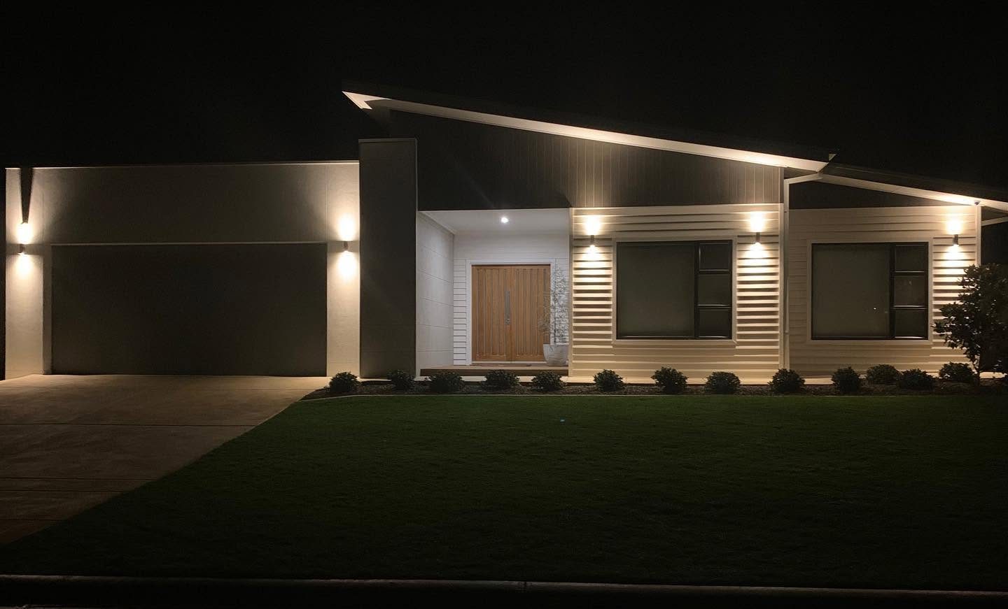 A new Nu-Concept home lit at dusk, Wagga Wagga